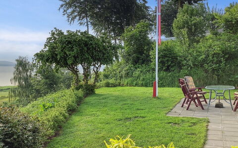 Launo - 150M to the Fjord: Roof, House, Home, Cottage, Siding, Estate, Driveway, Garden Buildings, Yard, Shed