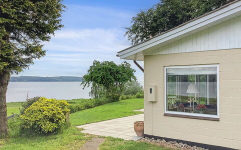 Launo - 150M to the Fjord: Roof, House, Home, Cottage, Siding, Estate, Driveway, Garden Buildings, Yard, Shed
