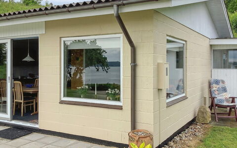 Launo - 150M to the Fjord: Roof, House, Home, Cottage, Siding, Estate, Driveway, Garden Buildings, Yard, Shed