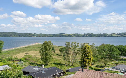 Launo - 150M to the Fjord: Roof, House, Home, Cottage, Siding, Estate, Driveway, Garden Buildings, Yard, Shed