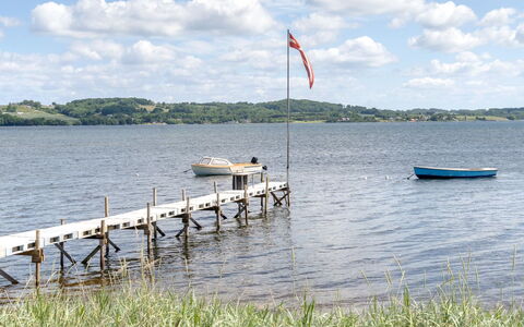 Launo - 150M to the Fjord: Roof, House, Home, Cottage, Siding, Estate, Driveway, Garden Buildings, Yard, Shed