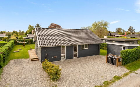 Nine - 200M from the Sea: Roof, House, Home, Cottage, Siding, Estate, Driveway, Garden Buildings, Yard, Shed
