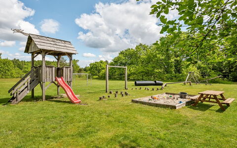Hariette: Playground Slide, Land Lot, Garden, Outdoor Play Equipment, Lawn, Chute, Backyard, Meadow, Yard, Landscaping