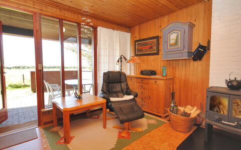 Neven - 900M from the Sea: Furniture, Interior Design, Flooring, Wood, Floor, Ceiling, Room, Chair, Lighting, Living Room