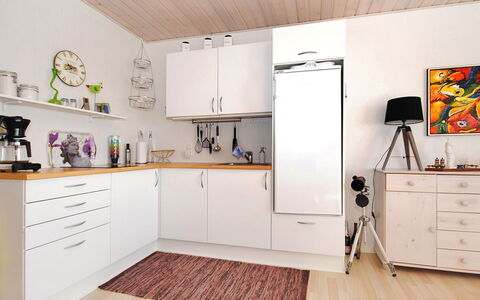 Rejhana - 500M to the Fjord: Flooring, Kitchen, Wood, Kitchen Appliance, Major Appliance, Cabinetry, Interior Design, Countertop, Floor, Furniture