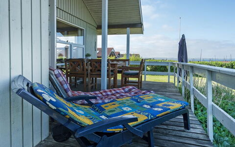 Pavo - 300M to the Fjord: Furniture, Porch, Outdoor Furniture, Chair, Table, Outdoor Table, Shade, Resort, Deck, Eco Hotel