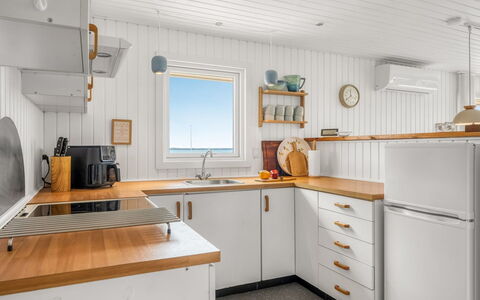 Pavo - 300M to the Fjord: Wood, Flooring, Kitchen, Interior Design, Floor, Countertop, Ceiling, Cabinetry, Room, Wood Stain