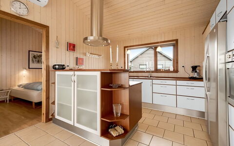 Malila - 400M to the Fjord: Kitchen, Flooring, Interior Design, Countertop, Wood, Kitchen Appliance, Floor, Ceiling, Cabinetry, Furniture