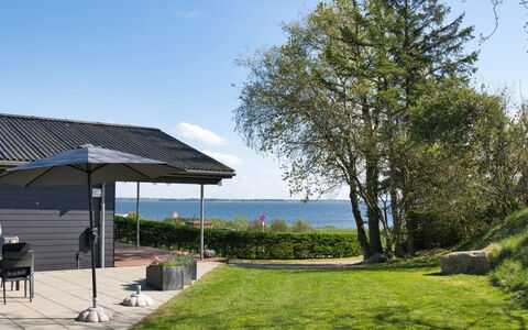 Elissa - 50M to the Fjord: Furniture, Interior Design, Flooring, Wood, Floor, Ceiling, Wood Flooring, Chair, Table, Lighting