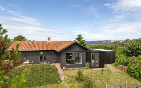 Lok - 90M to the Fjord: Wood, Roof, Architecture, Home, House, Cottage, Siding, Hardwood, Slope, Estate