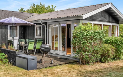 Brimi - 450M from the Sea: Roof, House, Porch, Home, Shrub, Cottage, Door, Siding, Garden, Groundcover