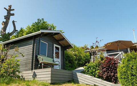 Gerhild - 300M from the Sea: Shrub, Home, Cottage, Roof, Siding, Outdoor Furniture, Garden, Garden Buildings, Shed, Yard