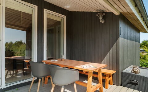 Gerhild - 300M from the Sea: Wood, Wood Stain, Hardwood, Plank, Furniture, Porch, Wood Flooring, Chair, Deck, Shade