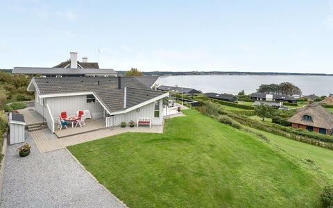 Eilen - 250M from the Sea: Roof, House, Home, Cottage, Door, Siding, Deck, Porch, Plank, Hardwood