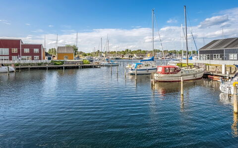 Milo - 5M from the Sea: Blue, Boat, Water, Body Of Water, Water Resources, Marina, Watercraft, Waterway, Channel, Reflection