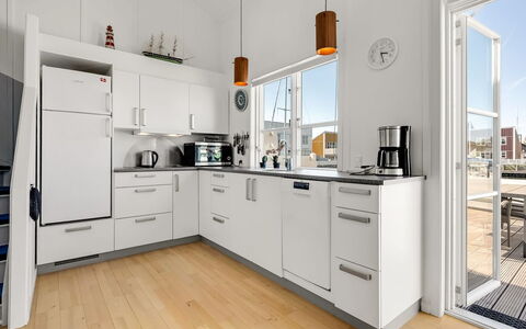 Milo - 5M from the Sea: Kitchen, Countertop, Kitchen Appliance, Cabinetry, Major Appliance, Flooring, Interior Design, Sink, Wood, Furniture