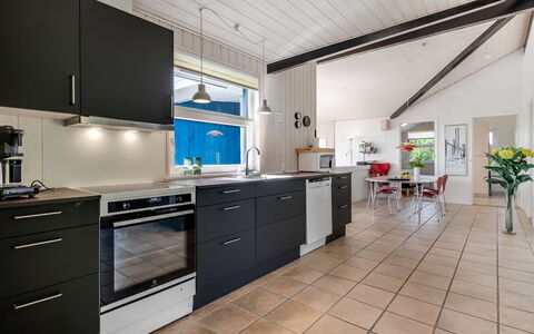 Sarita - 1Km from the Sea: Kitchen, Countertop, Kitchen Appliance, Flooring, Major Appliance, Interior Design, Cabinetry, Wood, Floor, Furniture