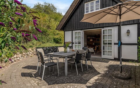 Eva - 1.5Km to the Fjord: Roof, Home, Cottage, Shrub, Garden, Flowerpot, Patio, Outdoor Table, Outdoor Furniture, Farmhouse