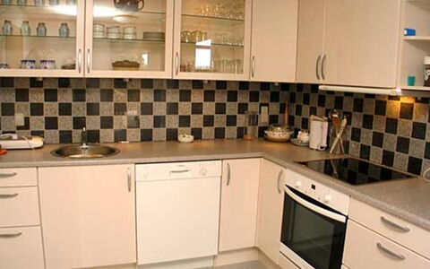 Piia - 800M from the Sea: Kitchen, Countertop, Kitchen Appliance, Cabinetry, Major Appliance, Interior Design, Furniture, Flooring, Cupboard, Kitchen Stove