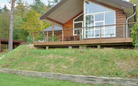 Piia - 800M from the Sea: Wood, Porch, Cottage, Home, Door, Hardwood, Siding, Deck, Estate, Garden Buildings