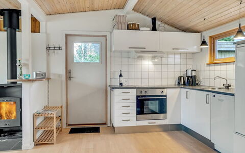 Joosua - 400M from the Sea: Wood, Flooring, Ceiling, Major Appliance, Kitchen, Interior Design, Floor, Home, Kitchen Appliance, Room