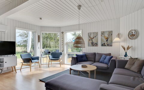 Ika - 600M from the Sea: Furniture, Interior Design, Flooring, Couch, Living Room, Wood, Floor, Ceiling, Home, Wood Flooring