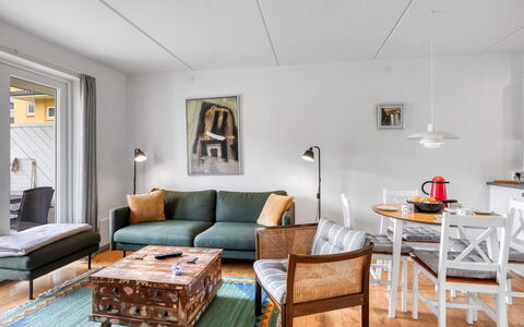 Jyrki - 100M from the Sea: Furniture, Interior Design, Couch, Flooring, Wall, Living Room, Floor, Table, Wood, Room