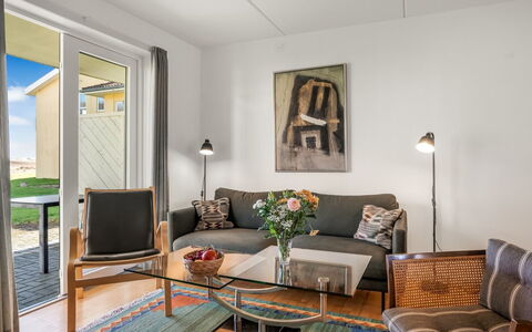 Jyrki - 100M from the Sea: Furniture, Interior Design, Flooring, Wall, Floor, Wood, Couch, Living Room, Table, Room