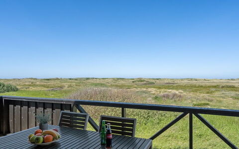 Viona - 350M from the Sea: Furniture, Hardwood, Wood Stain, Chair, Wood Flooring, Shade, Plank, Balcony, Deck