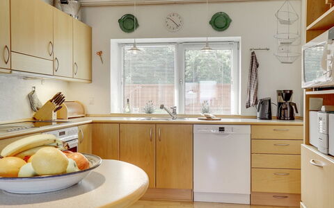 Yorrick - 50M to the Fjord: Countertop, Kitchen, Furniture, Interior Design, Cabinetry, Kitchen Appliance, Flooring, Wood, Lighting, Ceiling