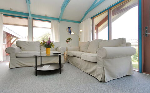 Momme - 500M from the Sea: Furniture, Flooring, Interior Design, Floor, Couch, Ceiling, Living Room, Lighting, Carpet, Room