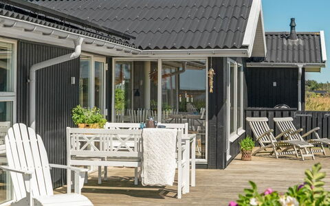 Aella - 150M from the Sea: Wood, Porch, Home, Roof, House, Cottage, Door, Siding, Shade, Deck