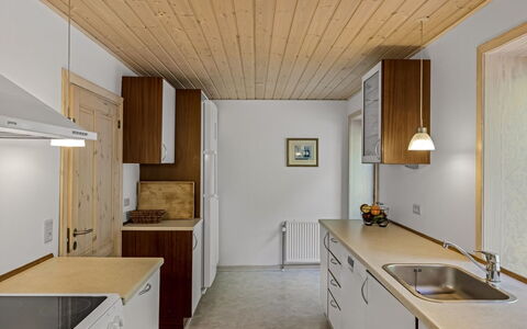 Etta - 957M from the Sea: Kitchen, Countertop, Interior Design, Flooring, Ceiling, Wood, Kitchen Appliance, Cabinetry, Floor, Furniture