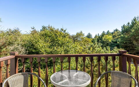 Etta - 957M from the Sea: Handrail, Baluster, Fence, Porch, Outdoor Table, Outdoor Furniture, Balcony, Deck, Hardwood, Wood Stain