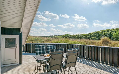 Aria - 1.2Km from the Sea: Wood, Hardwood, Porch, Plank, Deck, Wood Stain, Wood Flooring, Shade, Chair, Balcony