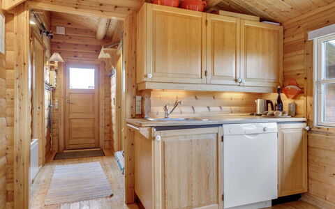 Thrym - 900M from the Sea: Kitchen, Wood, Sink, Countertop, Kitchen Appliance, Major Appliance, Flooring, Plumbing Fixture, Cabinetry, Tap