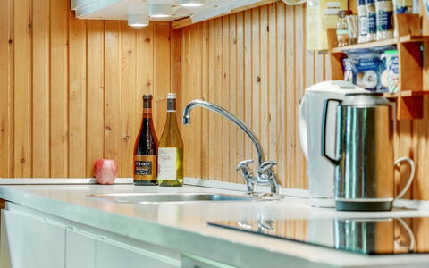 Asmod - 300M from the Sea: Wood, Kitchen, Countertop, Interior Design, Kitchen Appliance, Flooring, Lighting, Cabinetry, Home, Plumbing Fixture