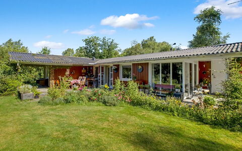 Hartvig - 800M from the Sea: Grass, House, Home, Shrub, Roof, Residential Area, Cottage, Land Lot, Garden