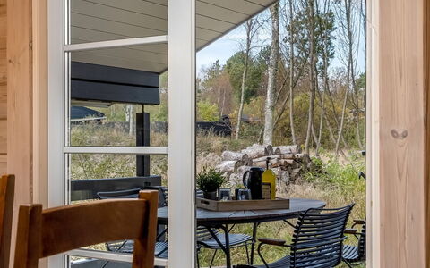 Tanas - 2Km from the Sea: Wood, Furniture, Floor, Chair, Outdoor Furniture, Wood Stain, Hardwood, Shade, Glass, Porch