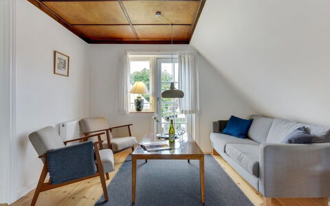 Liina - 200M from the Sea: Furniture, Flooring, Interior Design, Floor, Wood, Wood Flooring, Chair, Ceiling, Living Room, Lighting