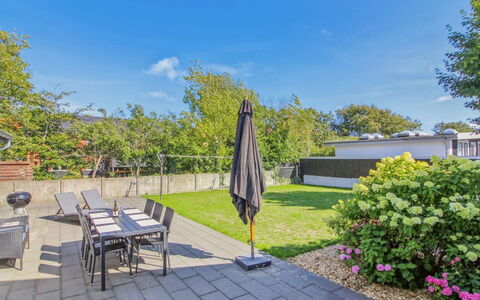 Kælle - 500M from the Sea: Shrub, Garden, Shade, Walkway, Landscaping, Lawn, Yard, Flagstone, Park