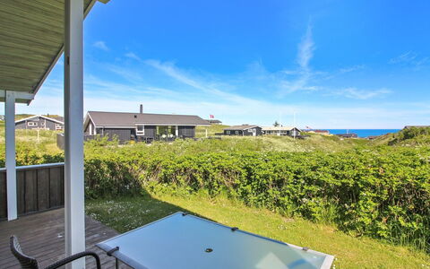 Terttu - 300M from the Sea: Grass, Home, Porch, Roof, Land Lot, Cottage, Estate, Groundcover, Shade, Siding