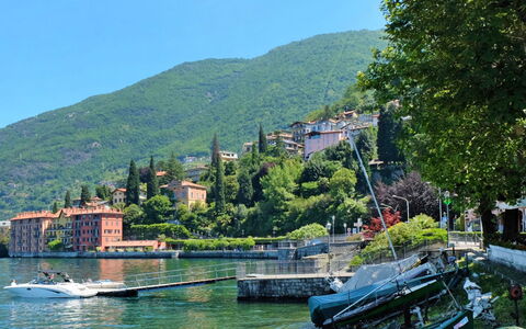 Condominio dei Giardini: Water, Plant, Building, Water Resources, Watercraft, Mountain, Boat, Sky, Vehicle, Tree