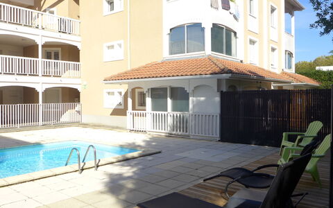 La Louisiane: Building, Window, Chair, Shade, Water, Swimming Pool, Condominium, House, Residential Area, Porch