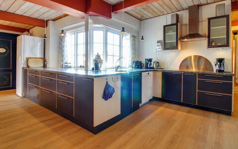 Tilla - 600M from the Sea: Flooring, Wood Flooring, Kitchen, Wood, Floor, Interior Design, Ceiling, Countertop, Cabinetry, Laminate Flooring