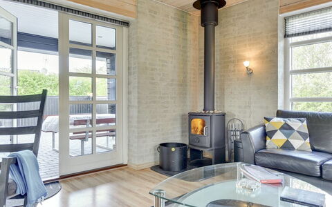 Fenja - 500M to the Fjord: Flooring, Interior Design, Floor, Room, Living Room, Ceiling, Wood Flooring, Chair, Wood-Burning Stove, Hardwood