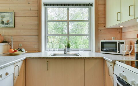 Fenja - 500M to the Fjord: Kitchen, Flooring, Countertop, Wood, Kitchen Appliance, Interior Design, Plumbing Fixture, Cabinetry, Floor, Furniture