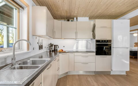 Adelia - 850M to the Fjord: Kitchen, Countertop, Flooring, Interior Design, Wood, Kitchen Appliance, Ceiling, Wood Flooring, Sink, Major Appliance