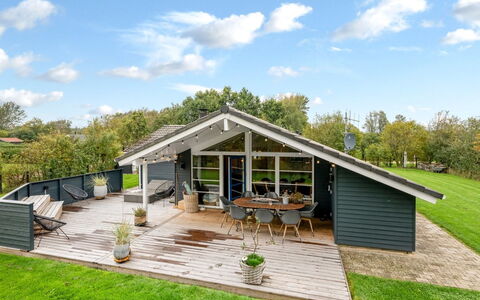 Martina - 560M to the Fjord: Home, Roof, Cottage, Porch, Siding, Estate, Shade, Hardwood, Deck, Plank