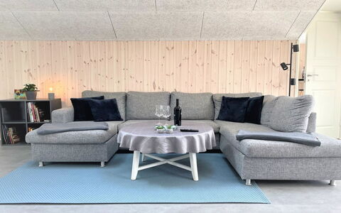 Gustaf - 400M to the Fjord: Furniture, Floor, Living Room, Wood Flooring, Couch, Chair, Hardwood, Coffee Table, Armrest